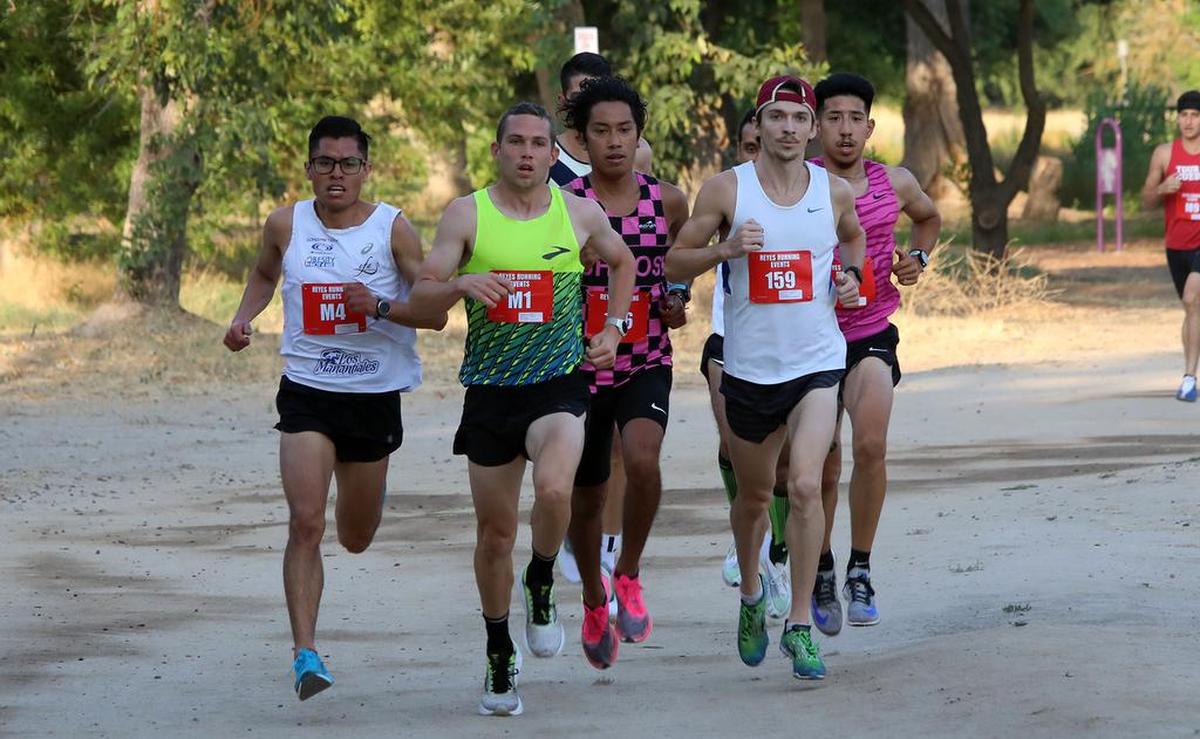 Miguel Reyes 5k race on July 25, 2021 at Woodward Park: Hesiquio Flores Romero (M4), CJ Albertson (M1), Evert Silva (196) and Kasey Knevelbaard (159) head toward the 1-mile mark.
