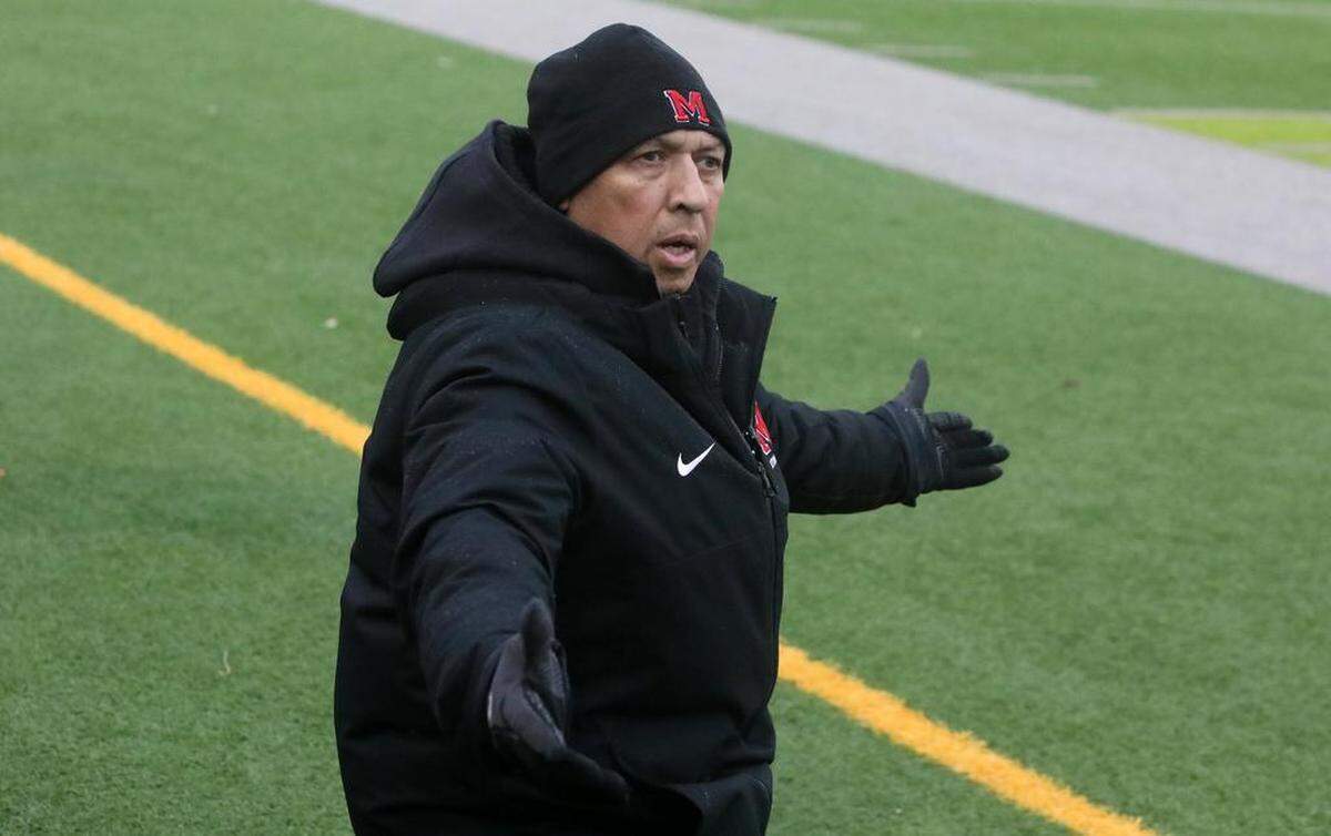 McLane High assistant coach Ramiro Terán questions a call during the Northern California Division III boys championship match March 4 at McLane High Stadium. Terra Linda won, 2-0.