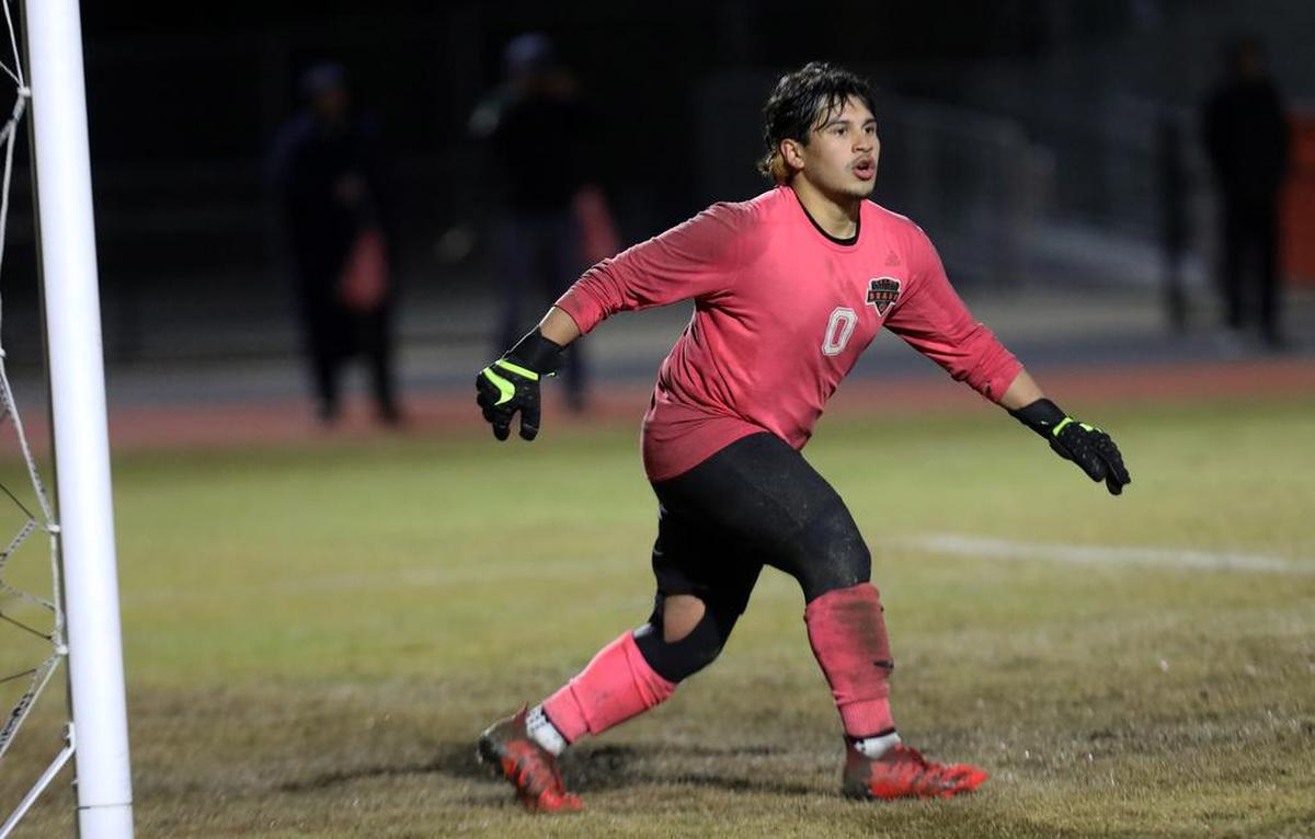 Selma High goalkeeper César Rocha prepares against the McLane High attack during a CIF Central Section Division IV boys semifinal match on Feb. 22, 2022. McLane won, 4-1.