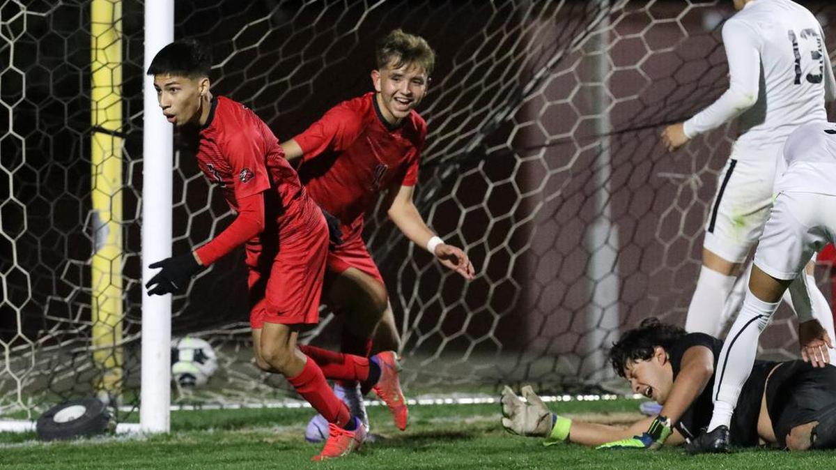 Kerman High sophomore Jonathan Velásquez reacts after scoring a game-winning goal with 4½ minutes left against Madera High in a CIF Central Section Division III soccer match.