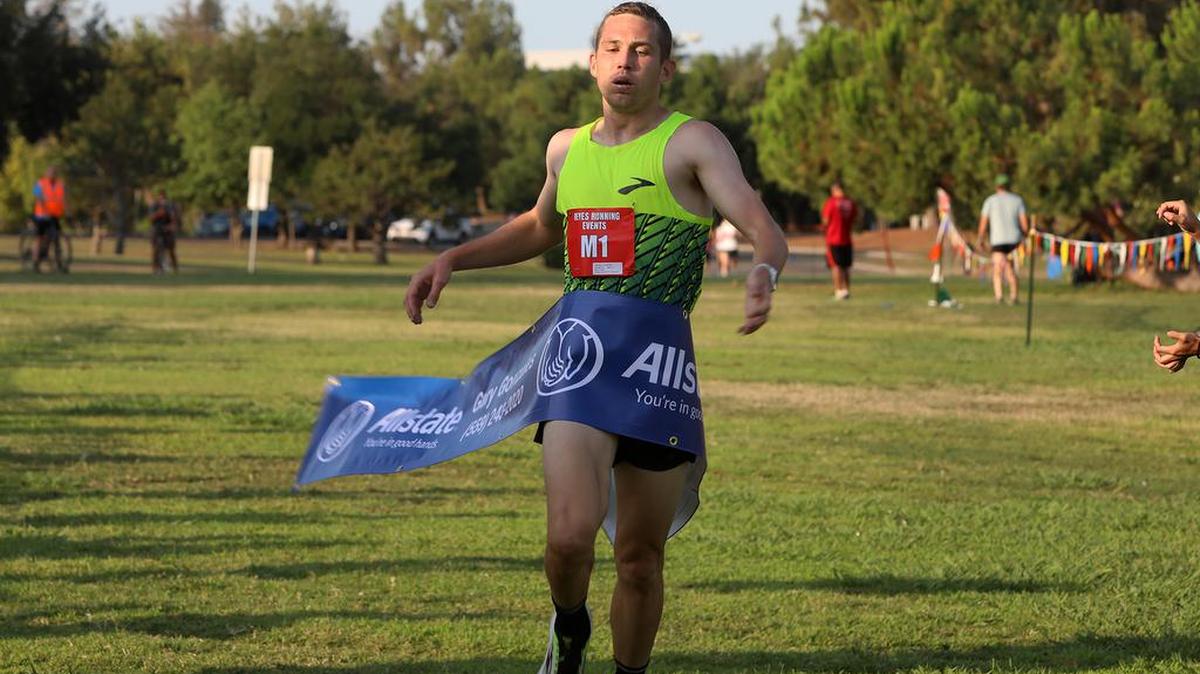 CJ Albertson won the July 25, 2021 Miguel Reyes 5k at Woodward Park with a time of 14:43.1.