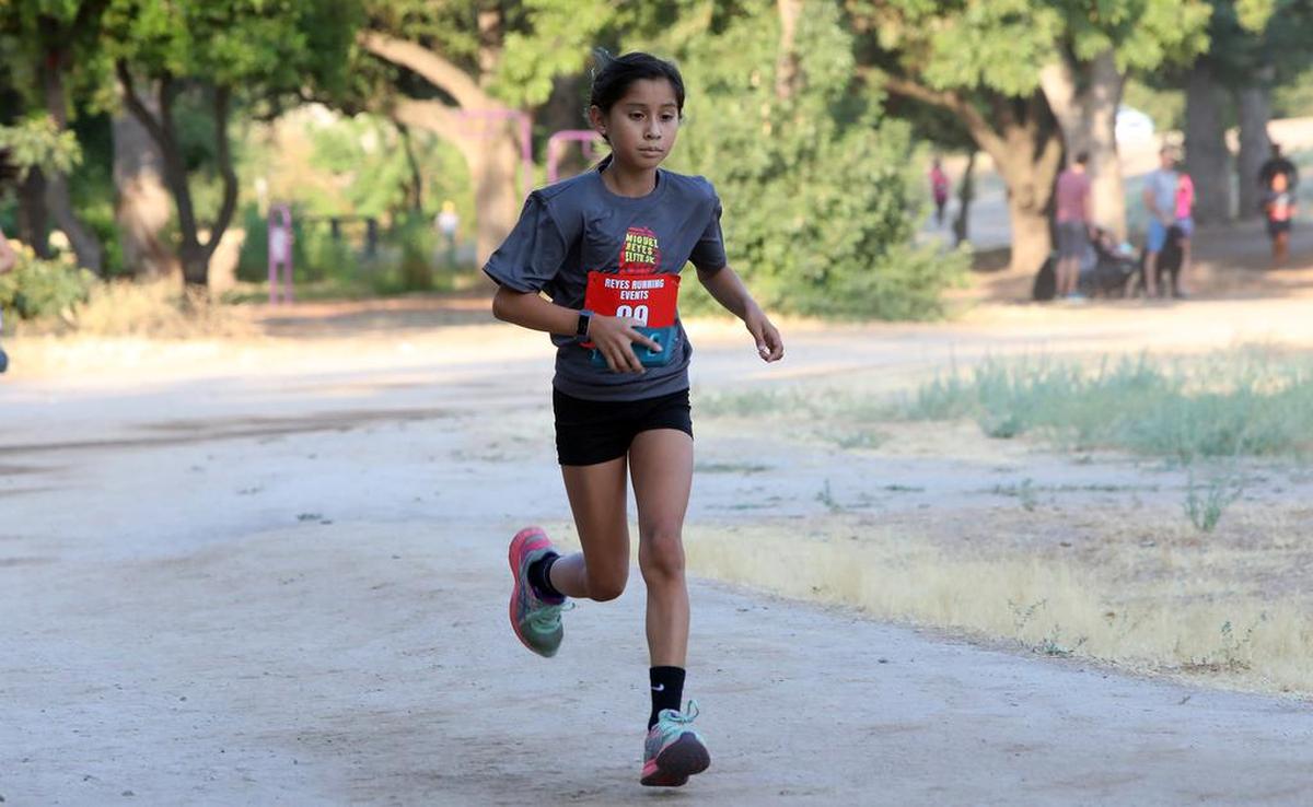 Miguel Reyes 5k race on July 25, 2021 at Woodward Park: Jesahbelle Chávez, second middle school female, 27:09.3.
