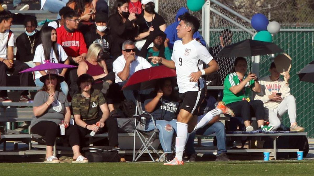 Central High senior Christopher Meza runs toward the stands after scoring a first-half goal that tied the game against Clovis East. Central's 2-1 win resulted in both teams finishing 7-2-1 in the TRAC.