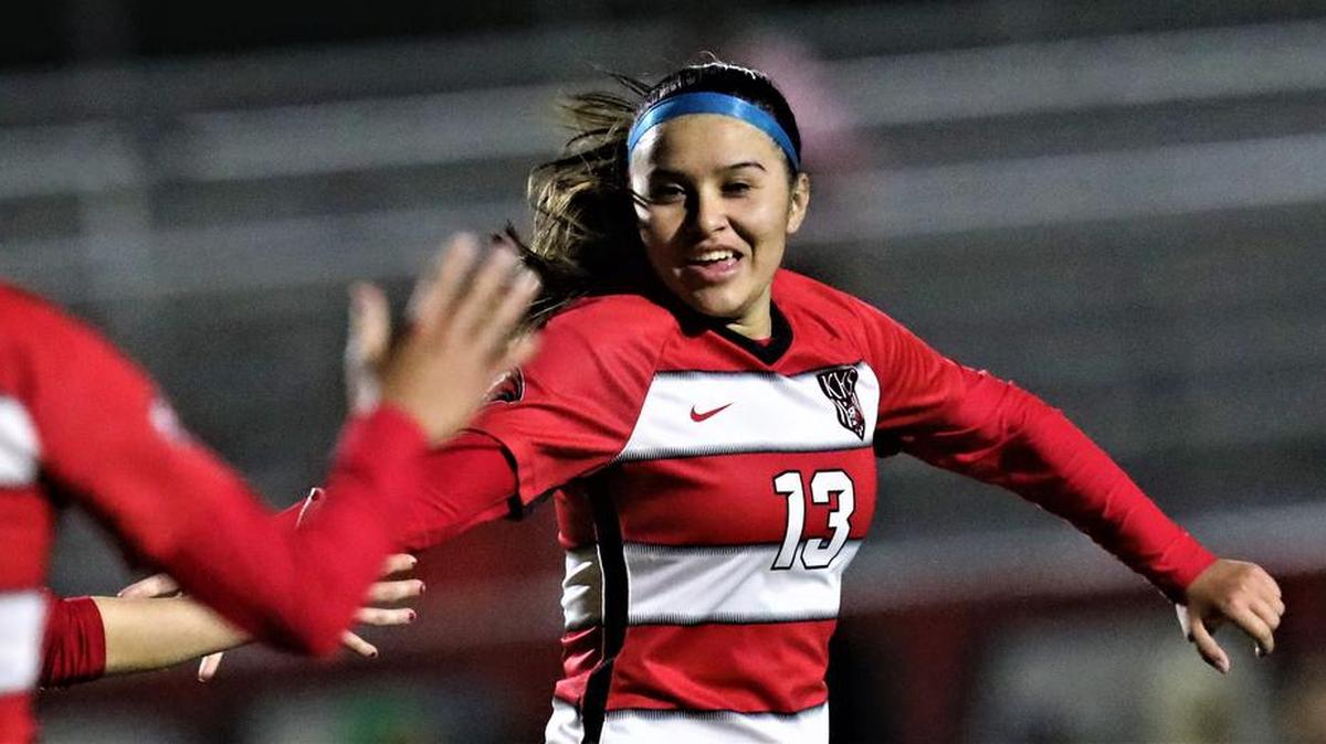 Kerman High junior Malyah Rodríguez celebrates one of her three goals in her team’s 6-0 win over Reedley High in the opening round of the CIF Central Section girls Division IV playoffs.