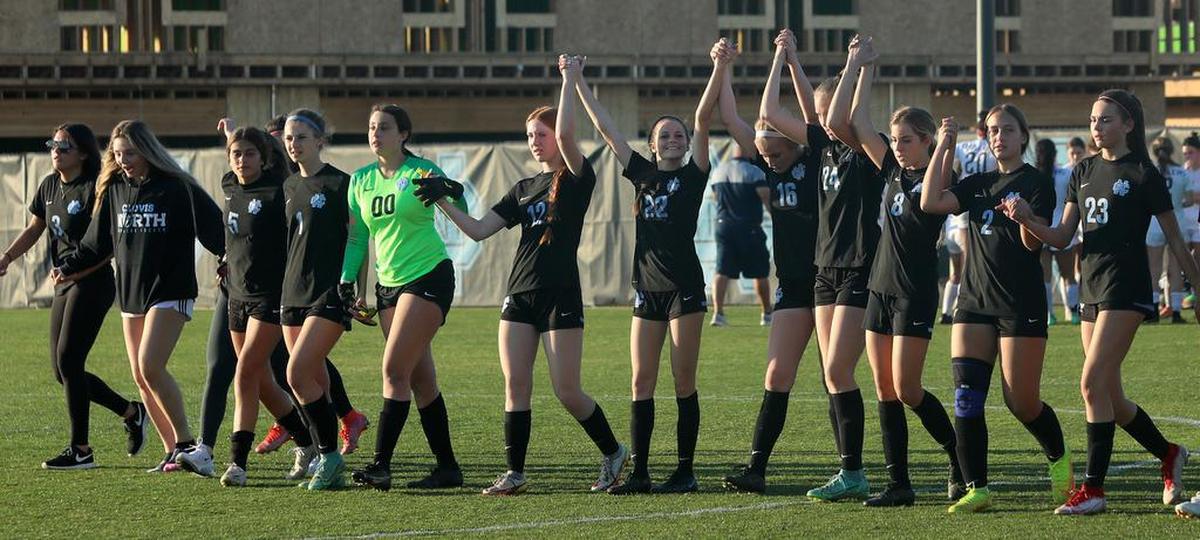 The third-seeded Clovis North girls soccer team thanks its fans following a 4-1 quarterfinal victory over visiting Bakersfield High in a CIF Central Section girls Division I match on Feb. 17, 2022.