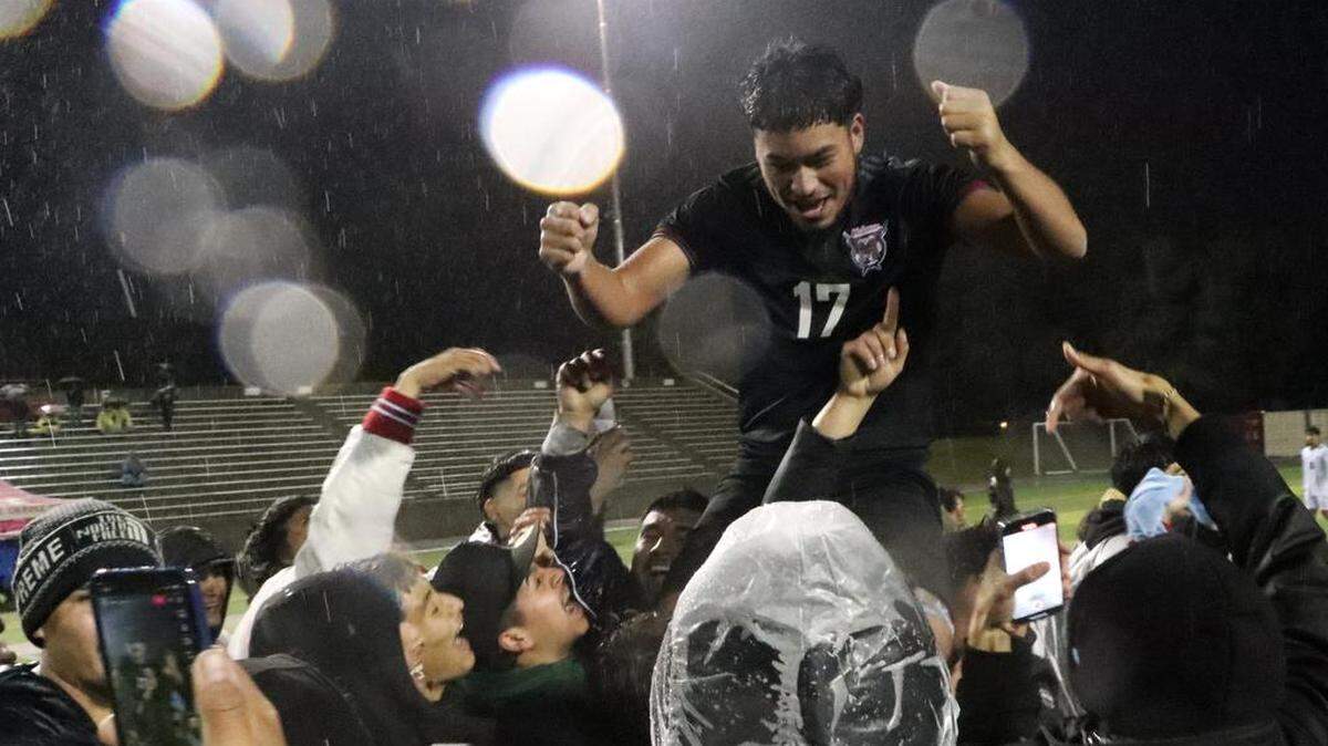 McLane High senior Víctor Luevano celebrates his team’s 3-2 win in overtime against Chávez High of Delano for the CIF Central Section Division III boys title at home on Feb. 24, 2023.
