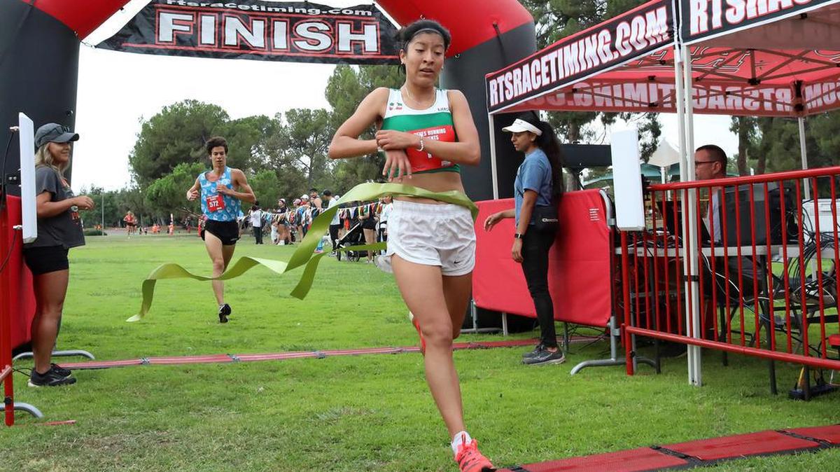 Alma Delia Cortes of México City was the female winner of the Miguel Reyes 5K at Woodward Park on July 31, 2022 in a course-record 16 minutes, 5.62 seconds.