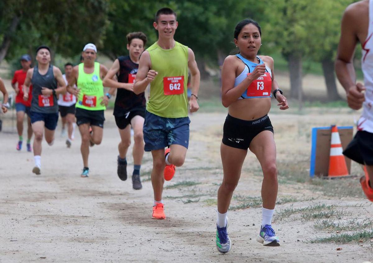 Cindy Meza Domínguez of México heads toward the 1-mile mark of the Miguel Reyes 5K at Woodward Park on July 31, 2022.