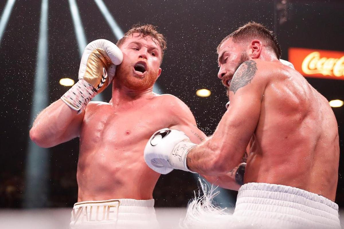 Canelo Alvarez of Mexico fights Caleb Plant of the USA during their super middleweight world championship title fight at the MGM Grand Garden Arena in Las Vegas.