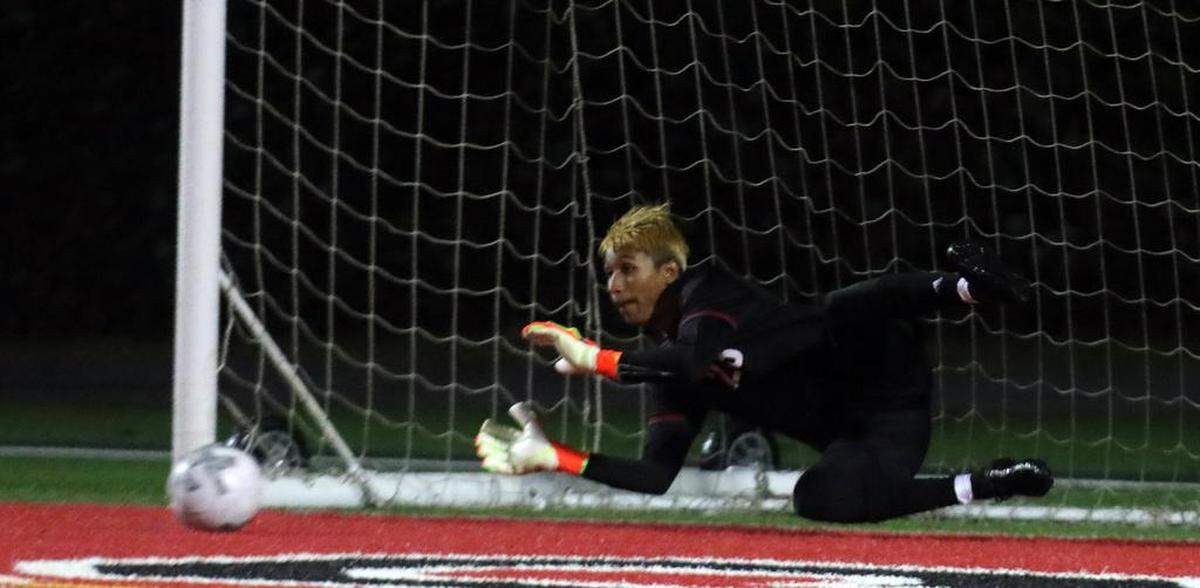 McLane High goalkepper Christian Martínez stopped this penalty kick that helped a 0-0 (5-3 PKs) win over Lincoln High of San José in the opening round of the Northern Californial Division III Regionals on Feb. 28, 2023 at McLane High Stadium.