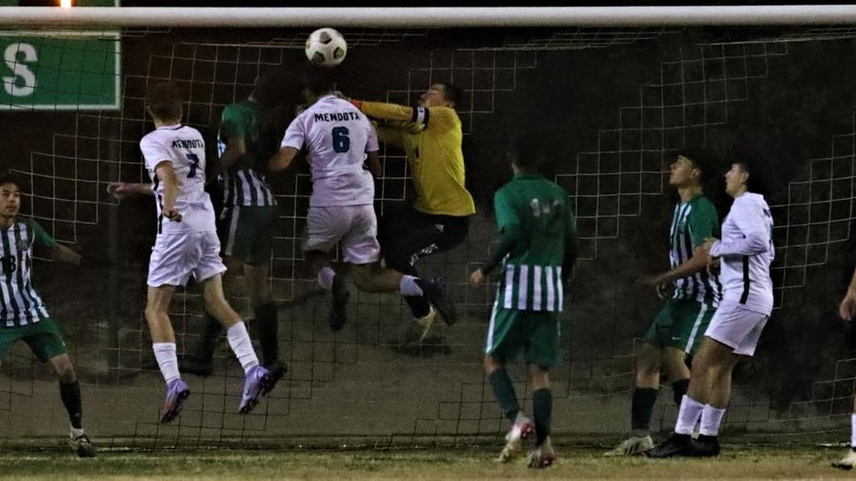 Mendota High junior Almilcar Pineda scored on this header coming on a corner kick to help Mendota score a 2-0 win over the No. 3-seeded Riverdale High.