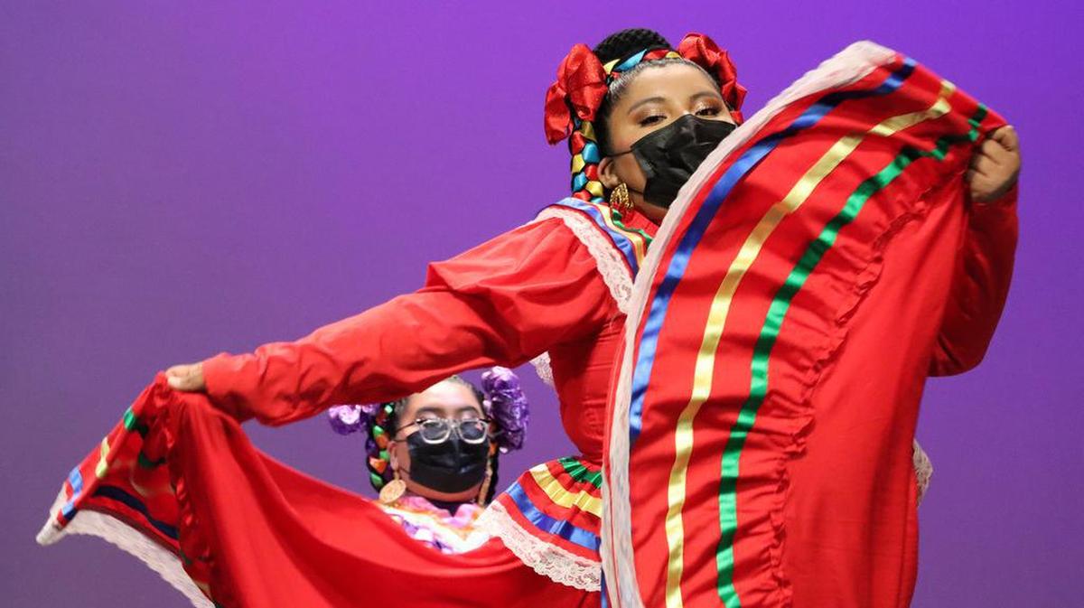 A dancer with Guerreros de Fresno High performs a dance from Jalisco during the 2022 High School Show Offs at Fresno High on March 12, 2022.