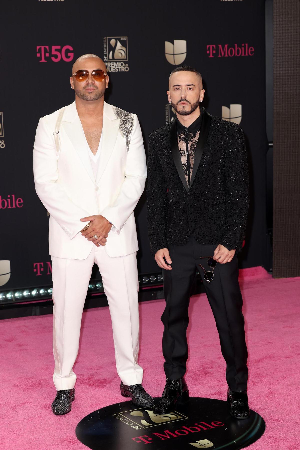 Wisin (L) and Yandel attend Univision’s 34th Edition Of Premio Lo Nuestro a la Música Latina at FTX Arena on February 24, 2022 in Miami, Florida.