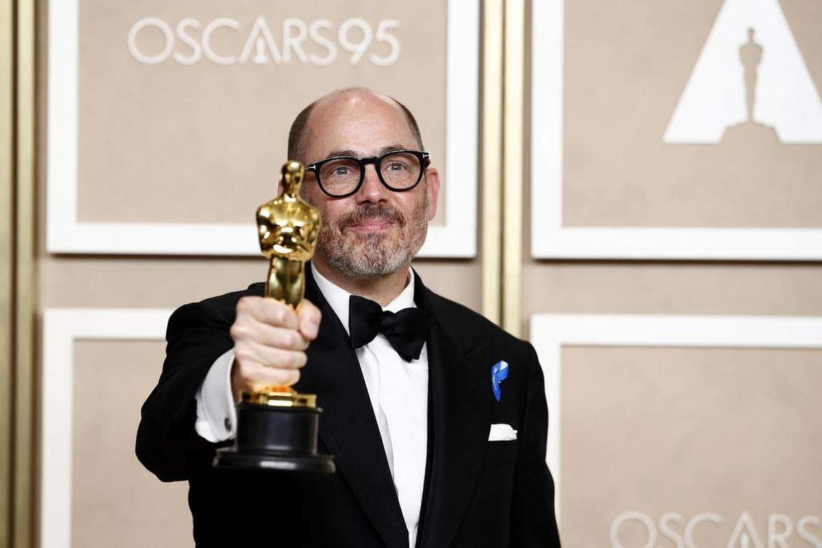 Edward Berger, Oscar winner for Best International Feature Film for ‘All Quiet on the Western Front’, poses in the press room during the 95th annual Academy Awards ceremony at the Dolby Theatre in Hollywood.