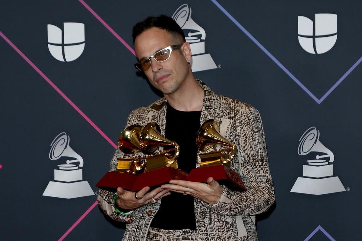 Alizzz poses with the Best Pop/Rock Song, Best Alternative Song and Best Recording Package awards in the press room during the 22nd annual Latin Grammy Awards ceremony at the MGM Grand Garden Arena in Las Vegas.