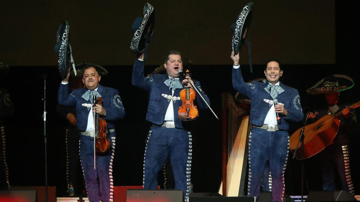 Members of Mariachi Vargas de Tecalitlán salute the audience during the 'Ay Amor! Serenata Pa'l Corazón' mariachi festival at the Save Mart Center on May 7, 2022.