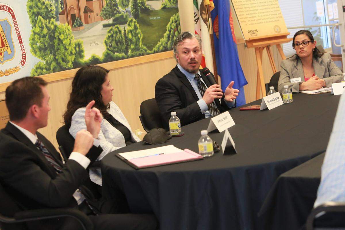 Sebastián Sánchez, associate secretary for farmworker liaison and immigrant services with the state Labor and Workforce Development Agency speaks during a round table on March 8 with Central Valley labor organizations in Fresno, California.