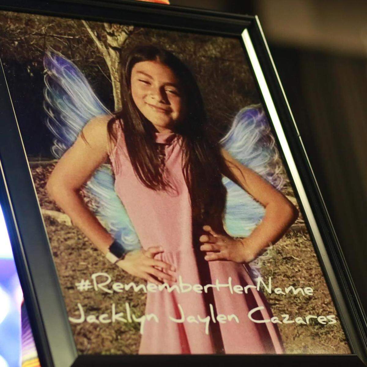 The photo of Jacklyn ‘Jackie’ Jaylen Cazares who was killed in Uvalde massacre is displayed on the stage at the Farmworker Women’s Conference in Visalia.