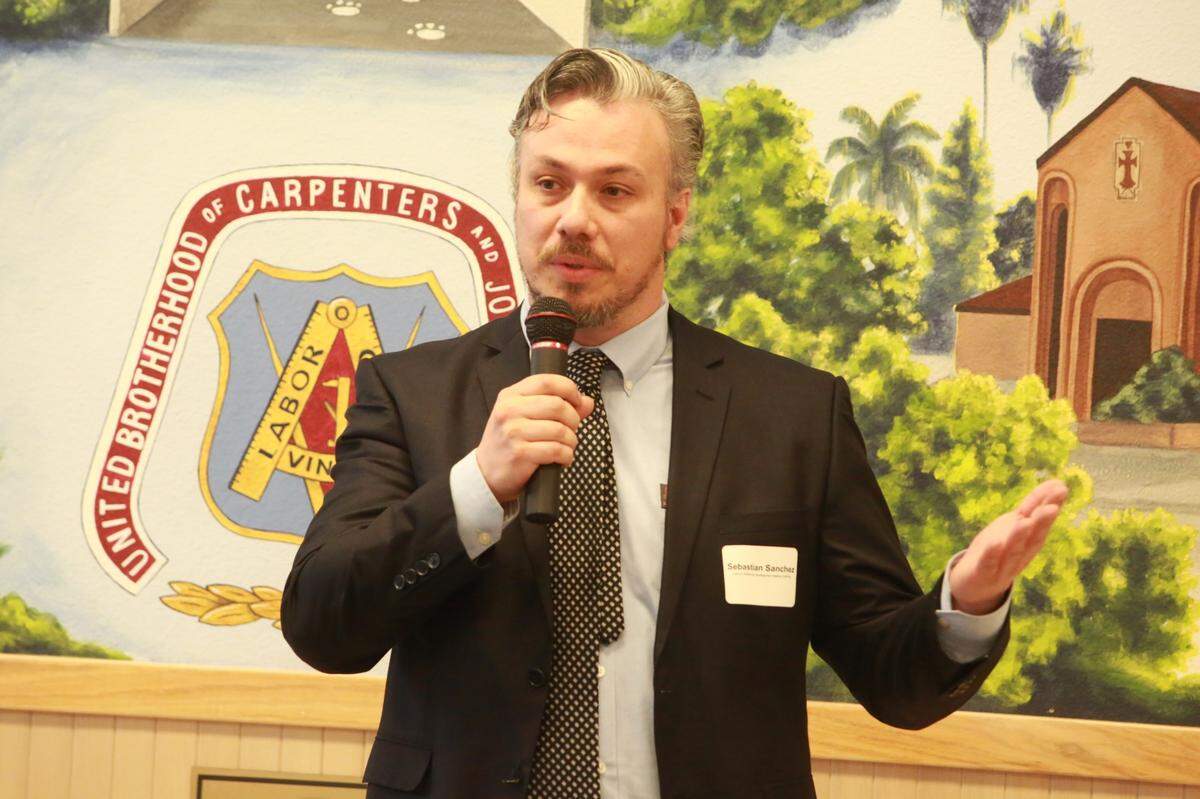 Sebastián Sánchez, associate secretary for farmworker liaison and immigrant services with the state Labor and Workforce Development Agency speaks during a round table on March 8 with Central Valley labor organizations in Fresno, California.