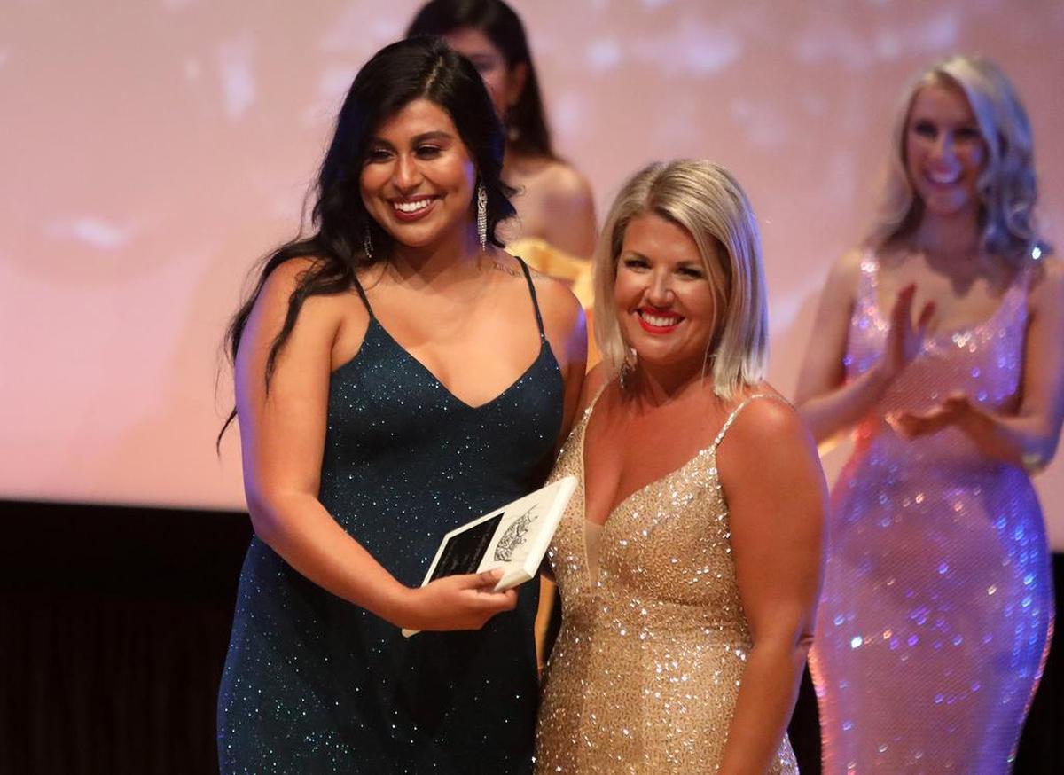 Miss Palmdale Rossana Martínez accepts the non-finalist talent (dance) award at the inaugural Miss California Volunteer Pageant at the Clovis Veterans Memorial Auditorum on July 10, 2021
