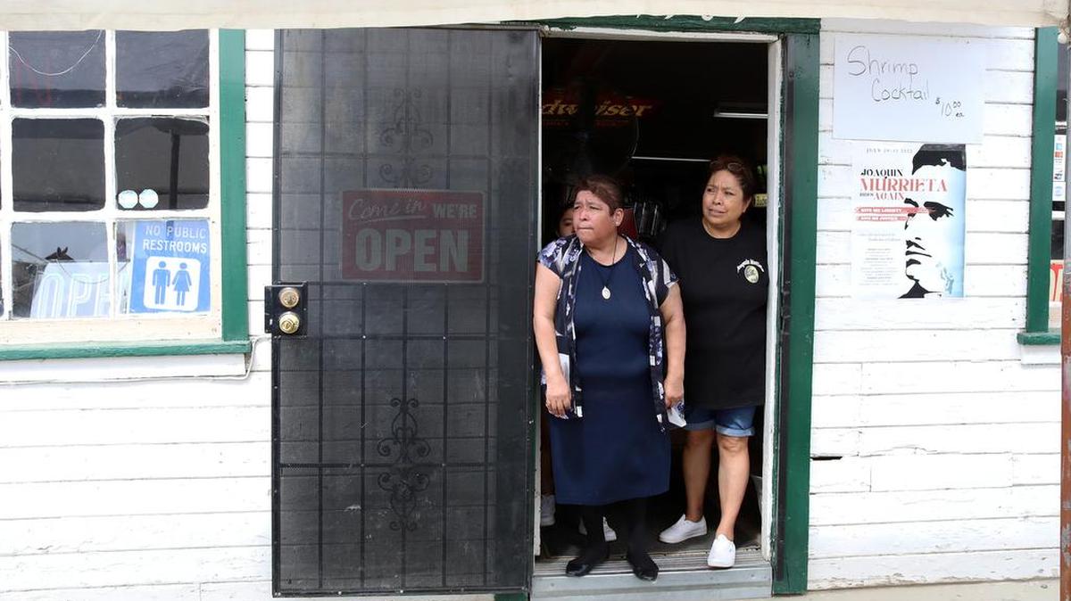 Half-Way Store owner Leticia Fernández looks a the activities during the final day of the Joaquín Murrieta Horse Pilgrimmage on July 31, 2022.