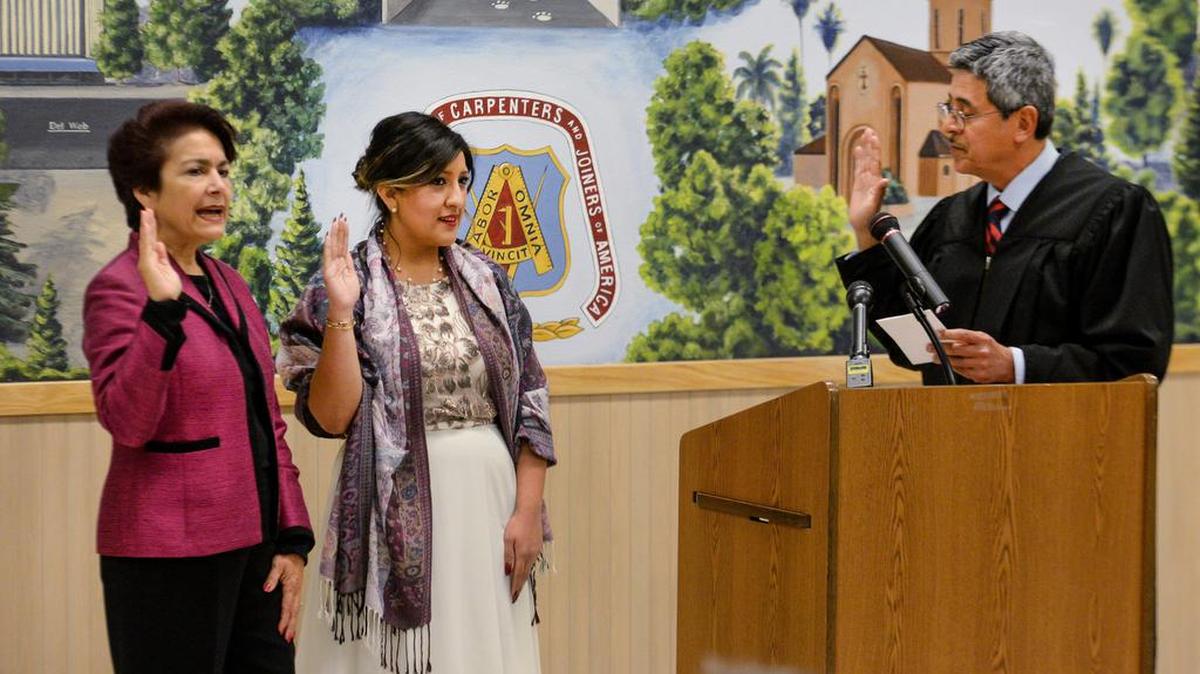 Fifth District Court of Appeal Justice Rosendo Peña Jr. swears in state Senators Anna Caballero, left, and Melissa Hurtado during a ceremonial joint community swearing-in ceremony for constituents, family and friends at the Carpenters Local Union 701 building in Fresno on Jan. 25, 2019.
