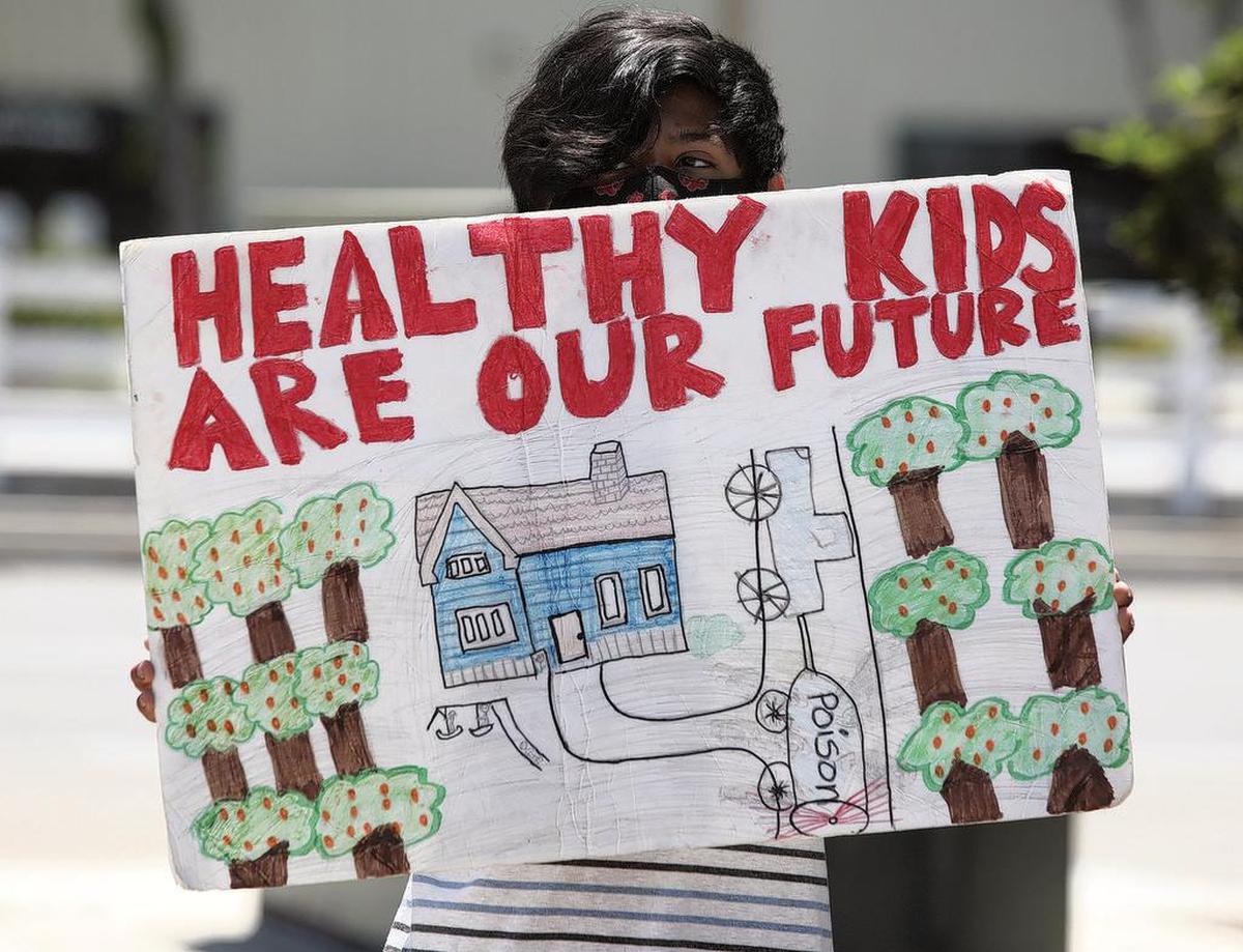 A boy supports drive&nbsp;to get county ag commissioners to post info online about pesticide spraying in advance.