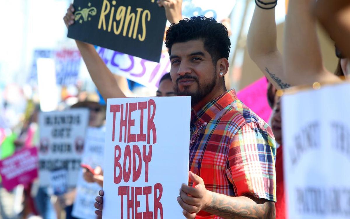 Esteban Guerra of Fresno was among an estimated 1,000 participants in the Rally for Roe on the corner of Blackstone and Nees on May 14, 2022.