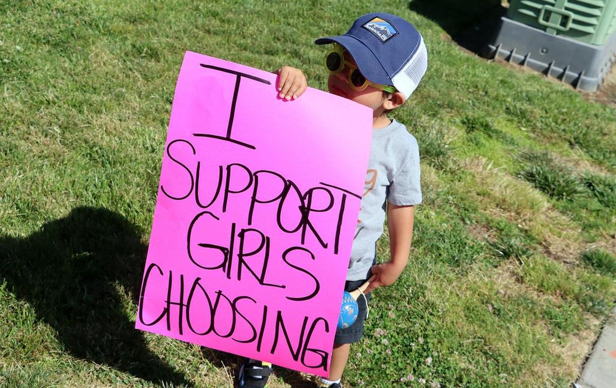 Eneko B, 2, shows his support at the Rally for Roe on the corner of Blackstone and Nees in Fresno on May 14, 2022.