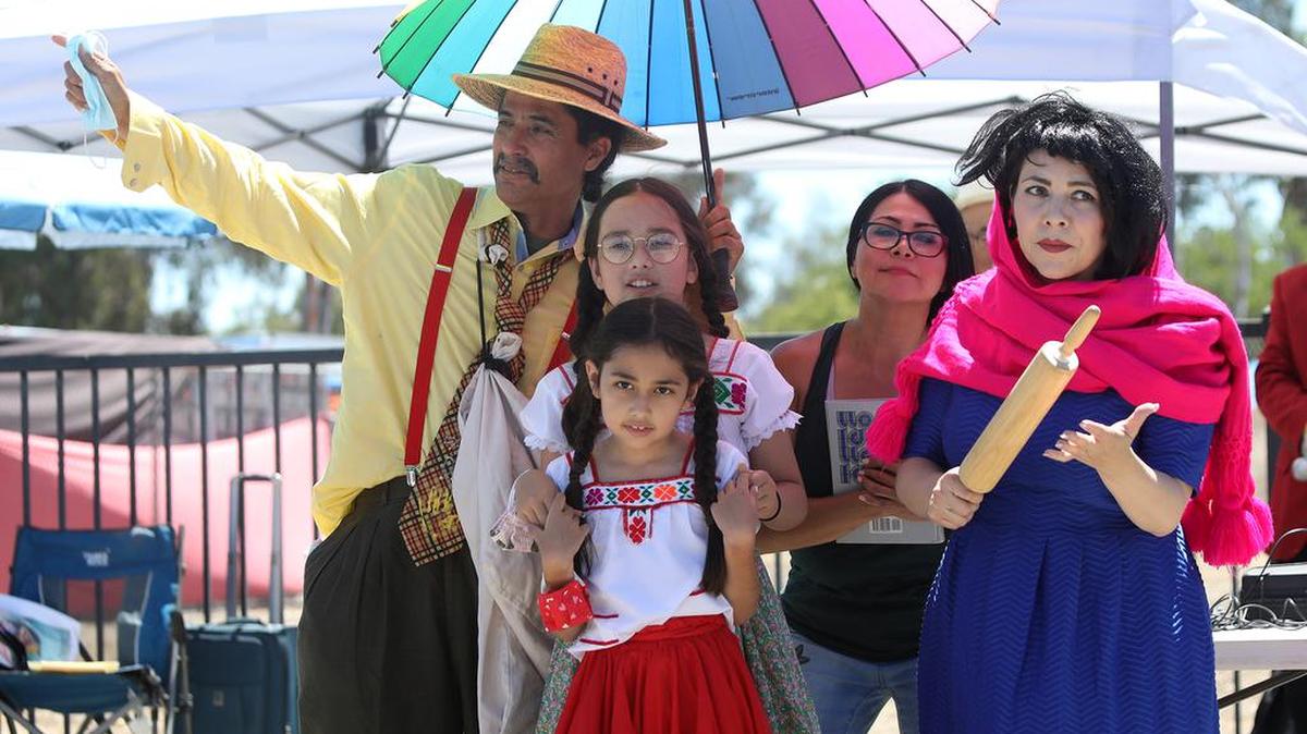 Members of Teatro La Familia Feliz performed in a pop up play at the Madera fairgrounds on June 13, 2021.