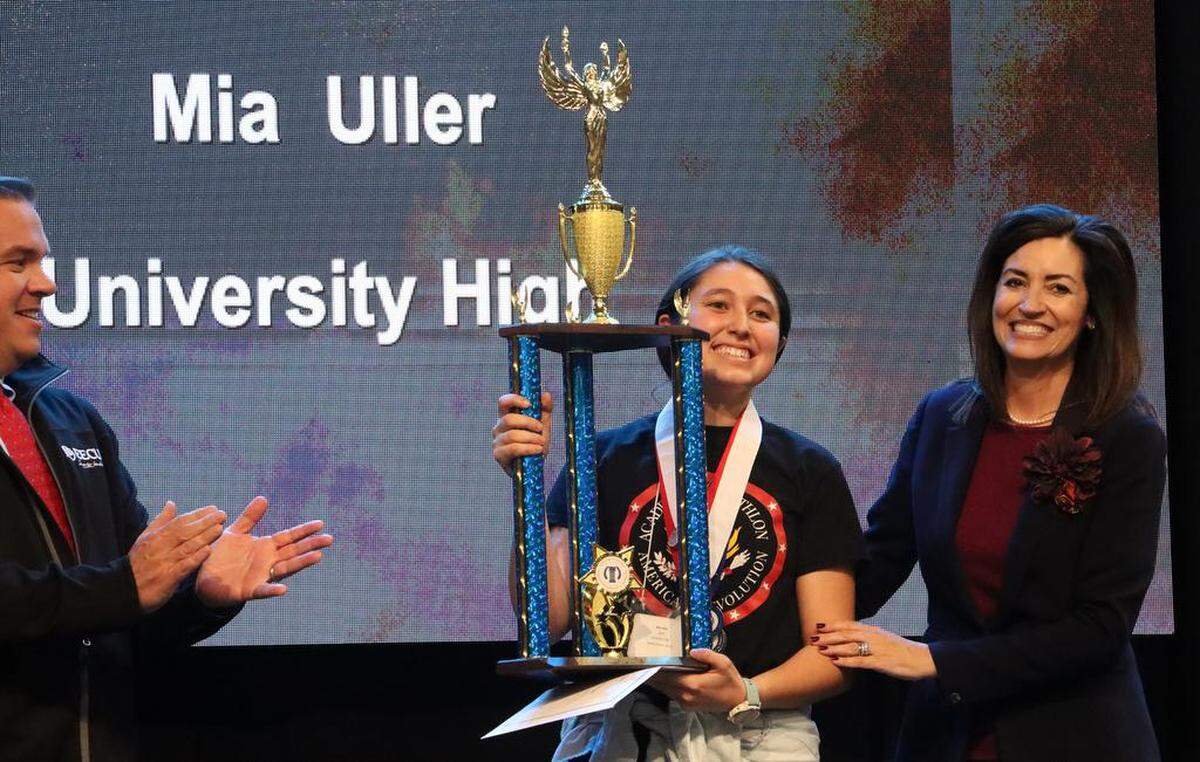 University High’s Mia Uller won the overall student contest with 9,027 points at the 2023 Fresno County Academic Decathlon. She is flanked by a representative of the sponsoring Fresno County Educational Employees Credit Union and Fresno County Superintendent Michele Cantwell-Copher.