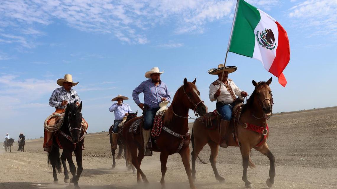 Riders and horses make their way from Firebaugh to Mendota on Saturday during the 2022 edition of the Joaquín Murrieta Horse Pilgrimage.