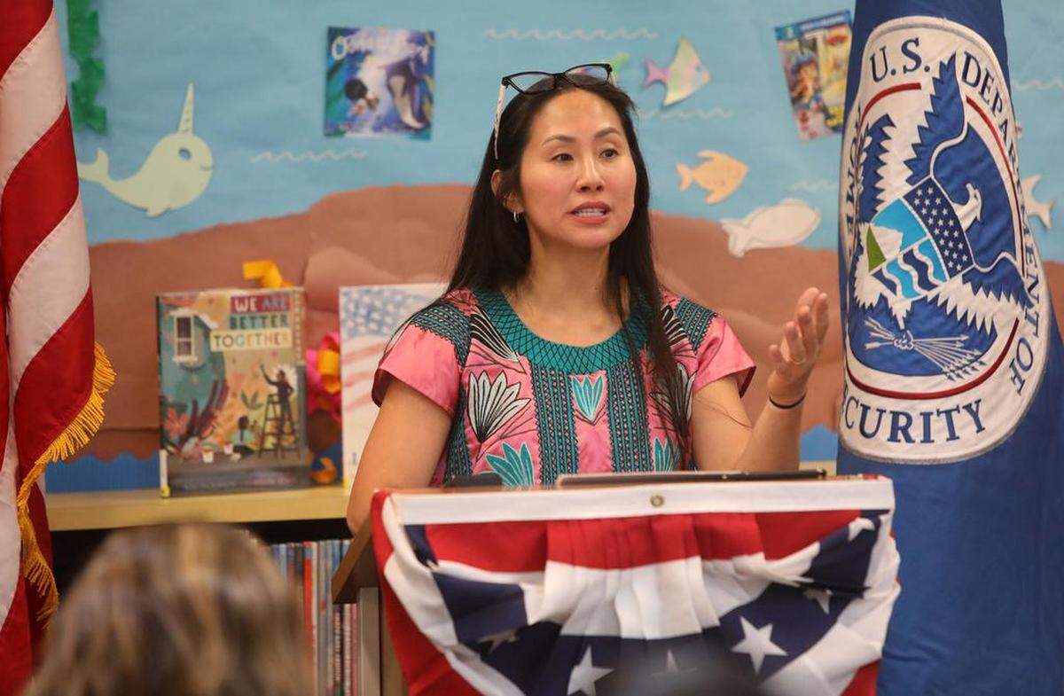 U.S. Citizenship and Immigration Services Field Office Director Lynn Feldman told the 20 young and new U.S. citizens to get involved in their communities during Sept. 16, 2022 ceremony at the Betty Rodríguez Regional Library.