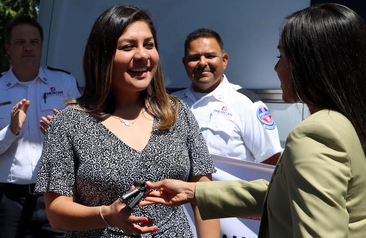 Fresno City Councilmember-elect Annalisa Perea hands over the keys to a donated ambulance to Naucalpan de Juárez, México Councilmember Ursula Cortes Fernández on Aug. 12, 2022.