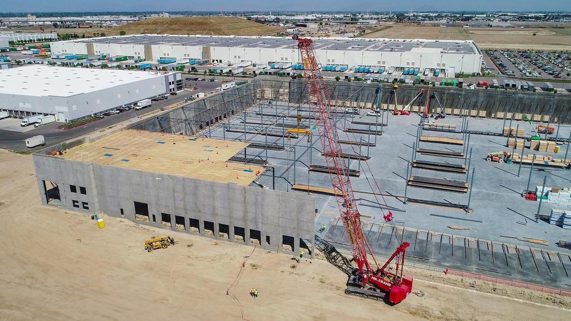 A second Amazon fulfillment center was taking shape just across the street from the first one in south Fresno as seen in this drone image on Thursday, April 15, 2021. The 470,000 square-foot warehouse, which operates 24/7, will reportedly bring in 1,000 new jobs to the area.