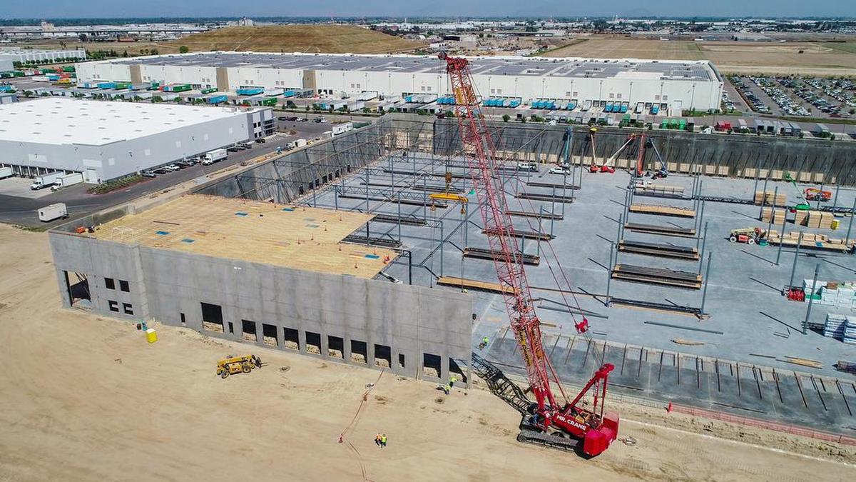 A second Amazon fulfillment center is already taking shape just across the street from the first one in south Fresno as seen in this drone image on Thursday, April 15, 2021. The 470,000 square-foot warehouse, which will operate 24/7, will reportedly bring in 1,000 new jobs to the area. The project was approved through a special settlement agreement with the city of Fresno on March 21.