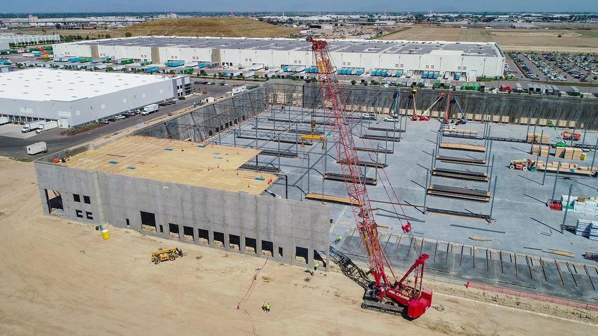 A second Amazon fulfillment center was taking shape just across the street from the first one in south Fresno as seen in this drone image on Thursday, April 15, 2021. The 470,000 square-foot warehouse, which operates 24/7, will reportedly bring in 1,000 new jobs to the area.