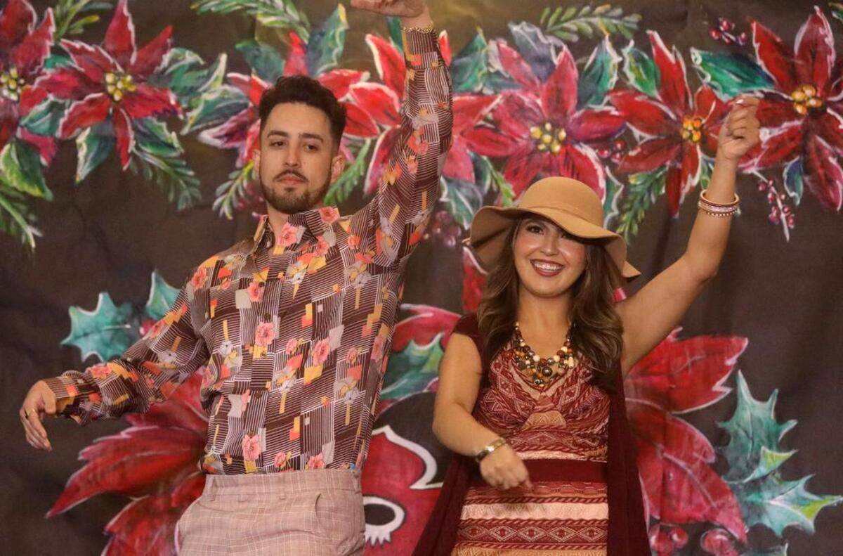 A couple dances during the 47th Fiesta Navideña Fashion Show at Fresno Fields on Dec. 4, 2022. The fundraiser was sponsored by the League of Mexican American Women.