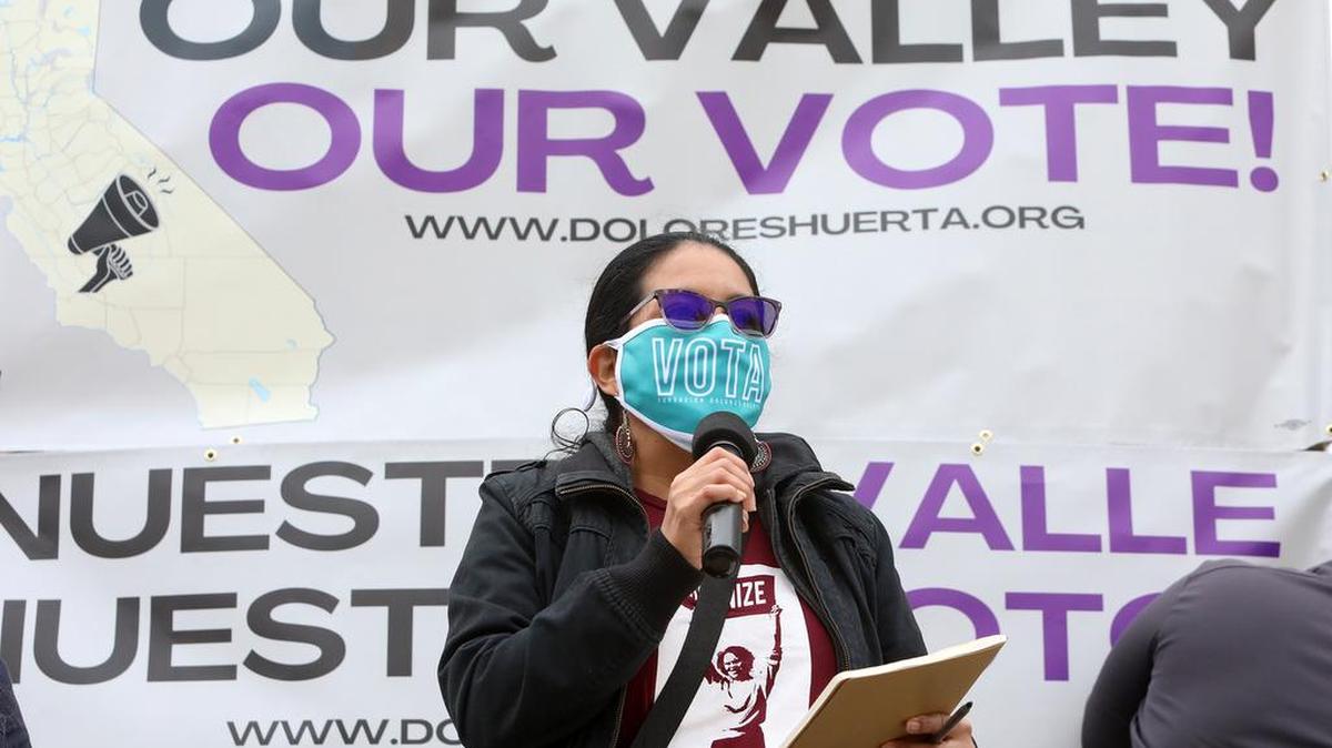 Camila Chávez, executive director of the Dolores Huerta Foundation, said boards of supervisors in the San Joaquín Valley need to pay attention to communities about their needs. Chávez, daughter of Dolores Huerta, spoke at a Dec. 4, 2021 rally at Fresno’s Courthouse Park.