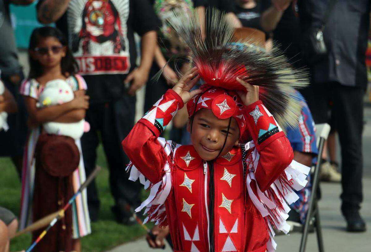 A Chukchansi tribe dancer performs during the third annual Indigenous Peoples Day celebration at Fresno City Hall on Oct. 10, 2022.