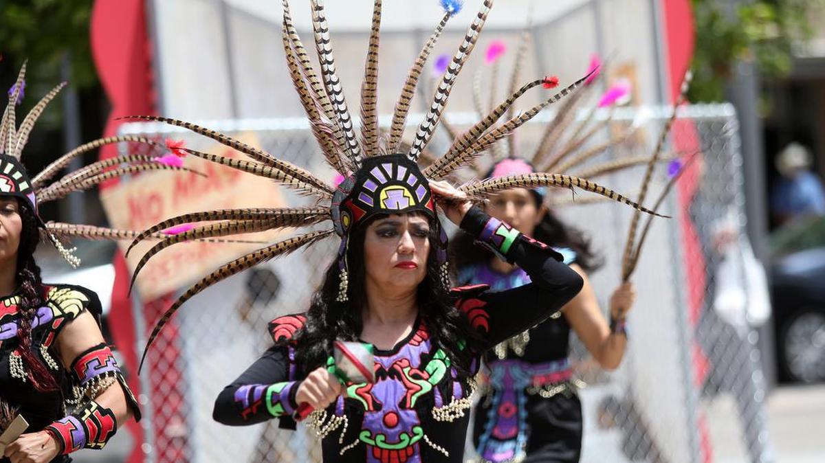 Mónica Cuevas performs an Aztec dance with Teocalli Cultural Academy during a May 2021 performance at the Fulton Mall. Cuevas, dean of counseling at Fresno City College, died Monday at age 54.