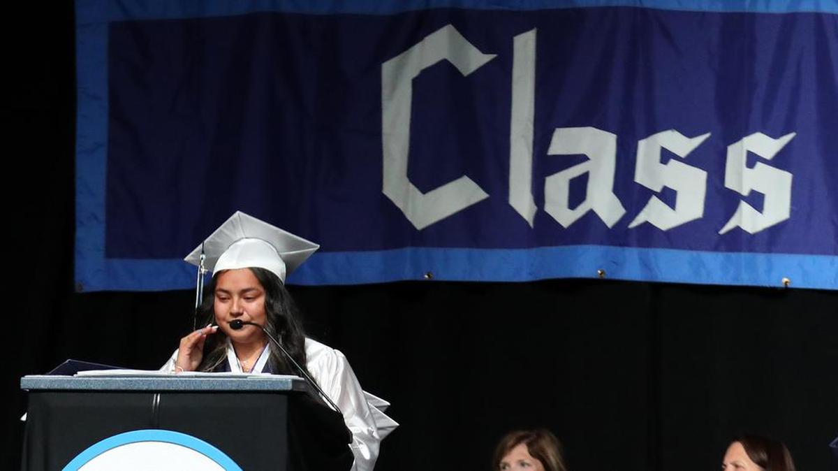 Bullard High School valedictorian speaker Cecilia Reyes speaks at the June 8, 2022 graduation ceremony at the Save Mart Center.