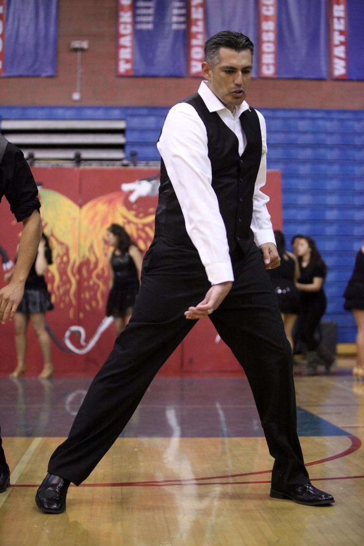Then Fowler High School principal Henry ‘Hank’ Gutiérrez peforms with his students at the 2011 High School Principals Lip Sync Contest.