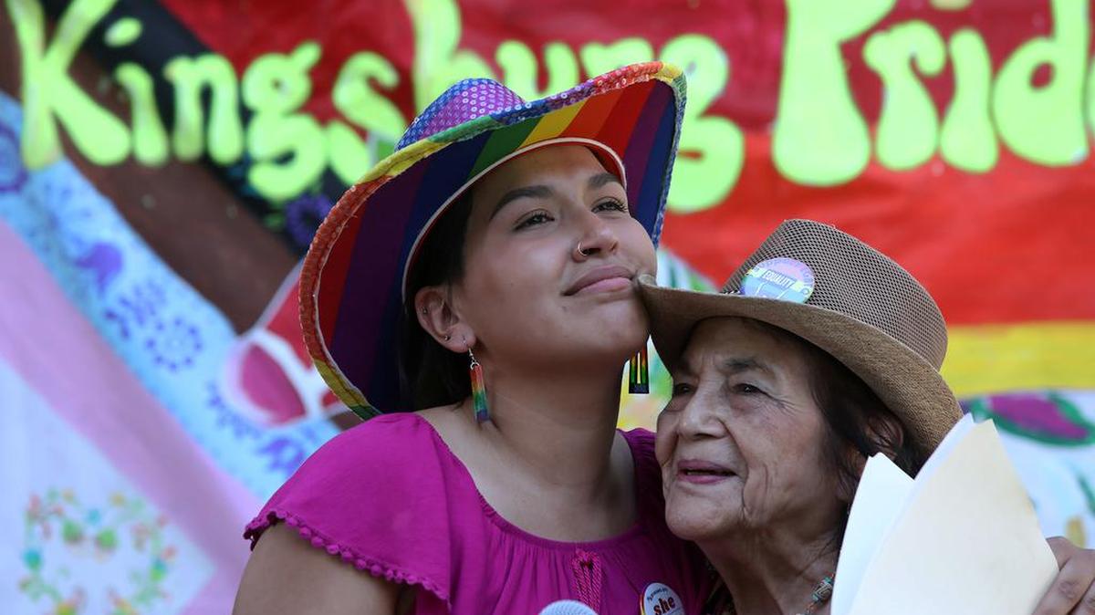 Kingsburg City Councilmember Jewel Hurtado hugs community activist Dolores Huerta during the Pride Rally that drew more than 250 people.