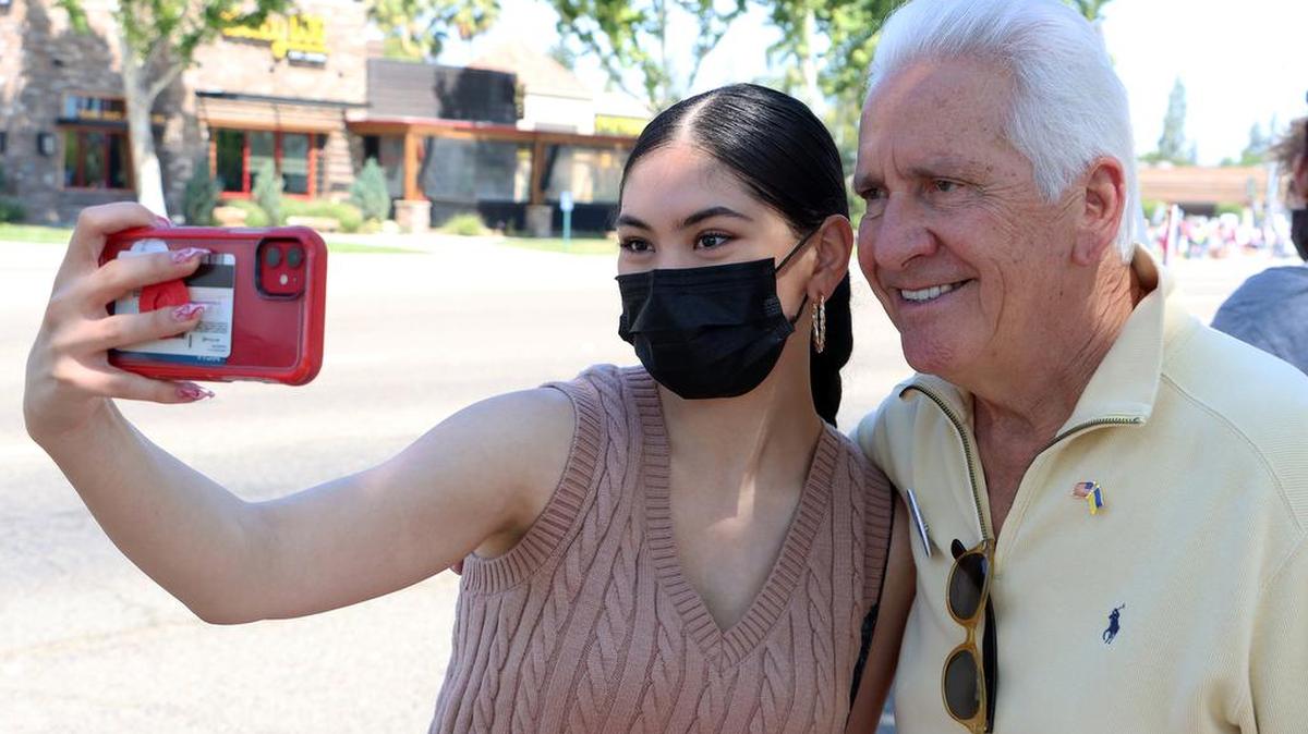Woman takes selfie with Rep. Jim Costa