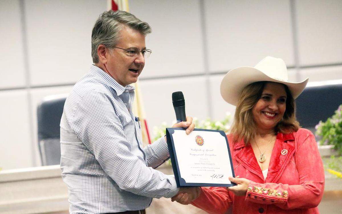 Congressman John Duarte, R-Modesto, presents a certificate to state Sen. Marie Alvarado-Gil during her community swearing-in on March 16, 2023.