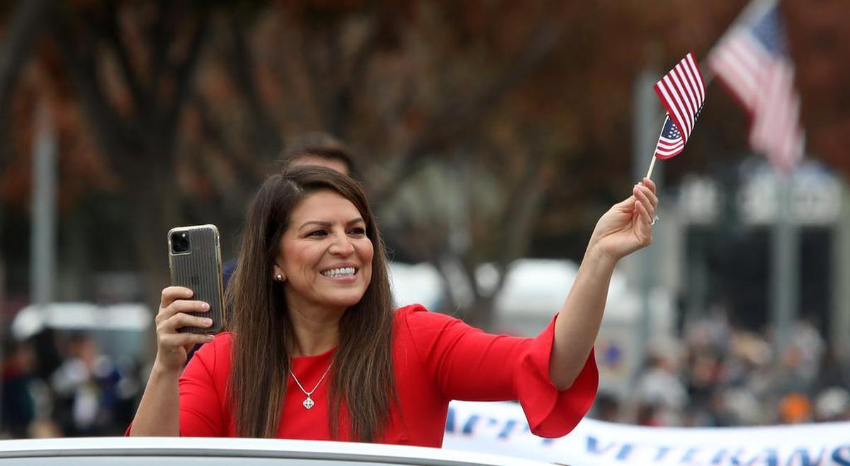 Fresno City Councilmember Esmeralda Soria waves along the Central Valley Veterans Day Parade route on Nov. 11, 2021.
