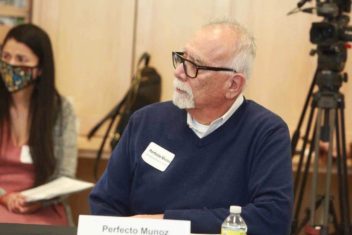 Perfecto Muñoz, with the West Modesto Collaborative listens during a round table on March 8 with Central Valley labor organizations in Fresno, California.