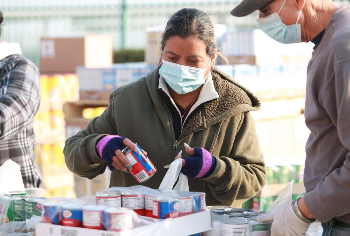 Orange Cove resident, Silvia Murillo, has volunteered to help bag food items at the food distribution site for about a year.