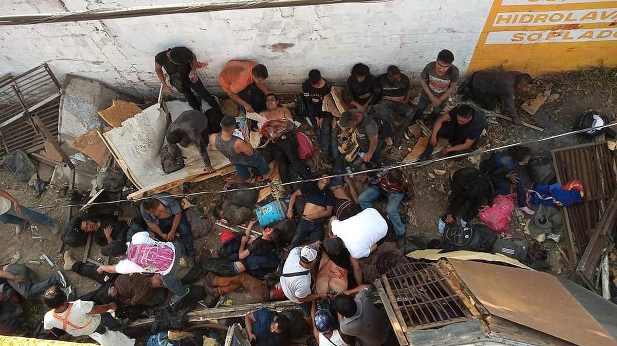 A handout photo made available by the newspaper El Sol de Chiapas, which shows migrants injured after a truck accident in which they were traveling in the Chiapas de Corzo municipality.